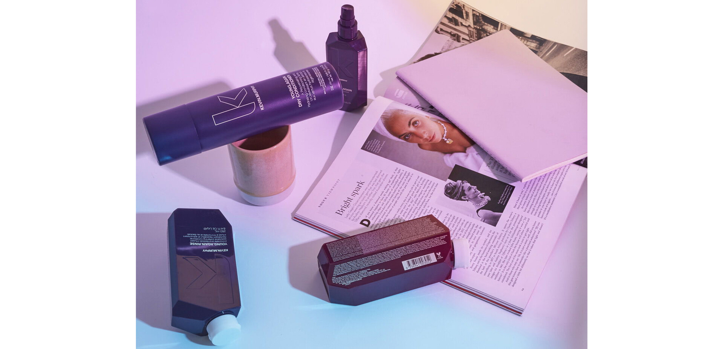 YOUNG.AGAIN DRY CONDITIONER beside a magazine.
